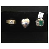 3- Sterling rings, 1+ clear gem, 1- green gem