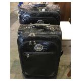 Kathy Van Zeland rolling luggage