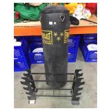Everlast punching bag and barbell rack