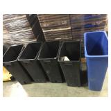 Lot of trash cans with odd lids