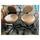 Pair of small rolling padded stools