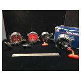 Lot of 4 Penn salt water ocean fishing reels -