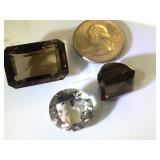 Various sizes & colors of gemstones, possibly