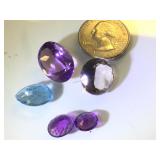 Various sizes & colors of gemstones, possibly