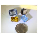 Various sizes & colors of gemstones, possibly