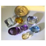 Various sizes & colors of gemstones, possibly
