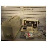 Domestic Sewing machine w/case, power on