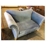 Oversized blue upholstered armchair