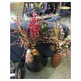 Pair of decorative vases with faux plants