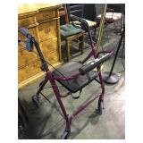 Rolling walker with seat