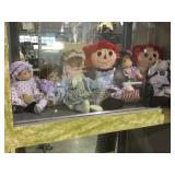 Shelf lot of dolls, Raggedy Ann & Andy,  ceramic