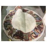 Round area rug, approx 70 in diameter