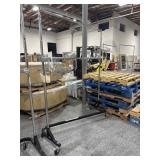 Double rod industrial garment rack with some