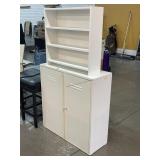 Metal locking cabinet and white shelf w/key and
