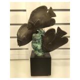 Metal fish sculpture on wooden stand 12 in tall