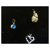 14k GOLD pendants, 1-rose, 1- heart, 1-evil eye