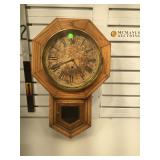 Antique wall clock - paper on metal face -