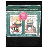 Pair of vintage Norman Rockwell Santa playing