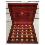 Wooden box with collectible McDonalds pins -