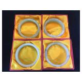4- Jade bangle bracelets, w/ decorative boxes
