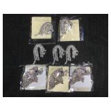 8 rhinestone brooches, all new