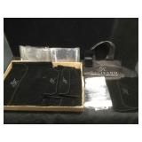 Several Kalifano cloth bags & plastic protectors