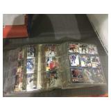 Stack of sports cards in pages