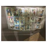 Stack of sports cards in pages