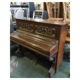 Wooden Upright piano on wheels w/hammers on good