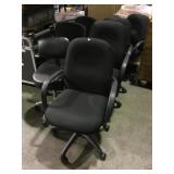 7 rolling Black office chairs