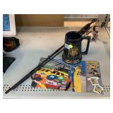 Shakespeare fishing rod, US Naval Stein mug and