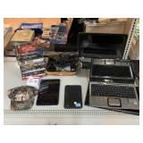 Laptops, tablets, portable selfie light and DVDs