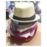 Stack of new fashion hats.