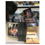 Star Wars DVDs and assorted Blu-ray movies.