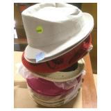 Stack of new fashion hats