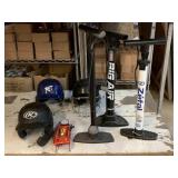 3 Sports helmets and 4 manual air pumps.