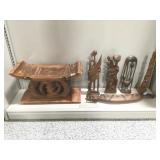 Wood seat/stool and carved figures.