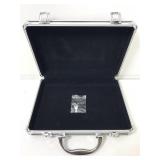 Locking case with key.