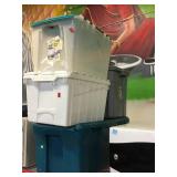 Assorted storage bins with lids.