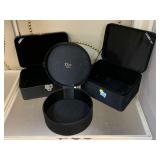 3 Jewelry/cosmetics storage bins.