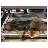 2 animal pelts. Boar and Beaver