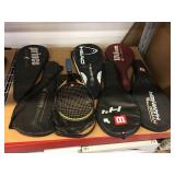 7 sports rackets with bags.