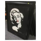 Damaged Marilyn Monroe print on canvas. Framed to