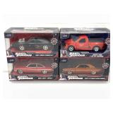 4 Fast n Furious Jada die cast cars in box.