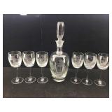 Etched decanter and glasses set.
