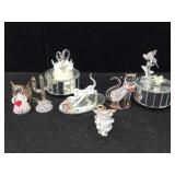 Decorative glass figurines and music box stands