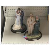 2 Ebony Treasures couples figurines.