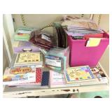 Scrapbooking papers, mat stack themed sheets and