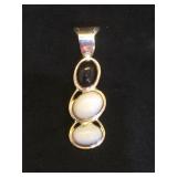 Sterling pendant w/ black & white gemstones, by