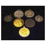 Assortment of coin pendants